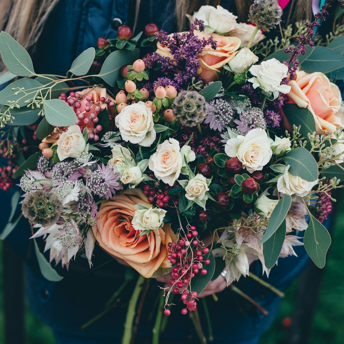 Customers learning flower arrangement at a hands-on florist workshop