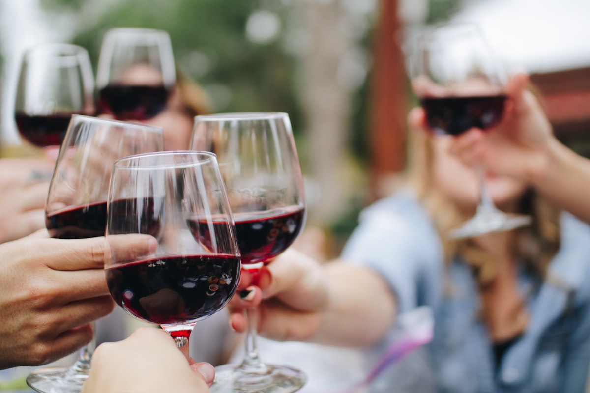 Tasters matched into groups by experience level at a wine club event