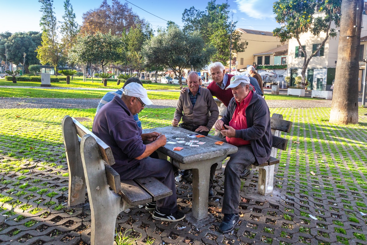 Senior center members discovering and signing up for various activity programs